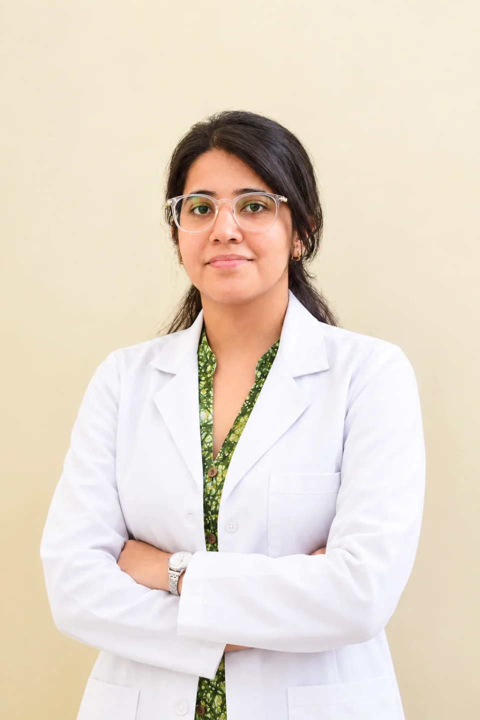 Dr. Nitika Grover, Obstetrician and Gynaecologist, wearing a white coat